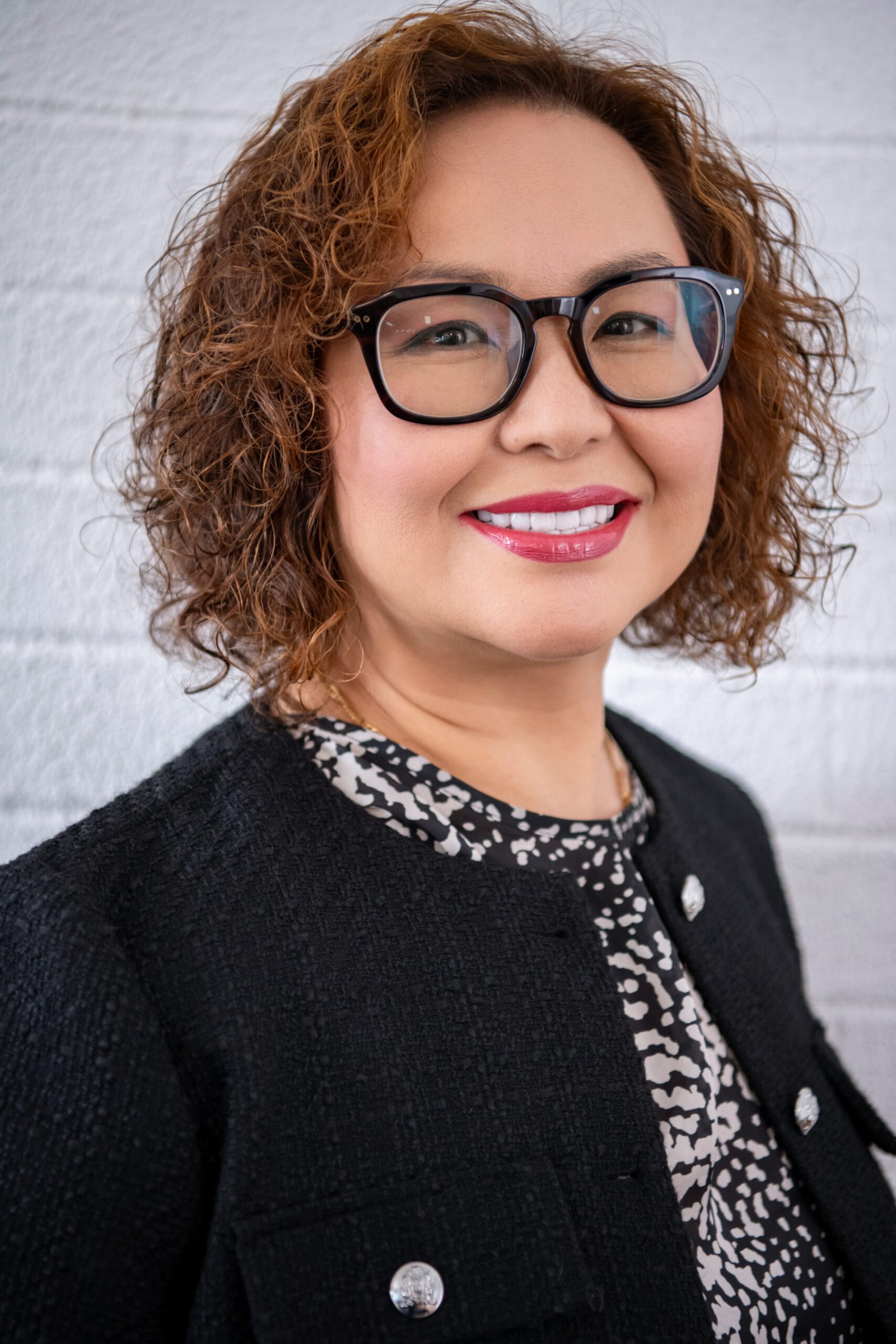 Portrait of Tina Le, Client Intake and Agreements Specialist