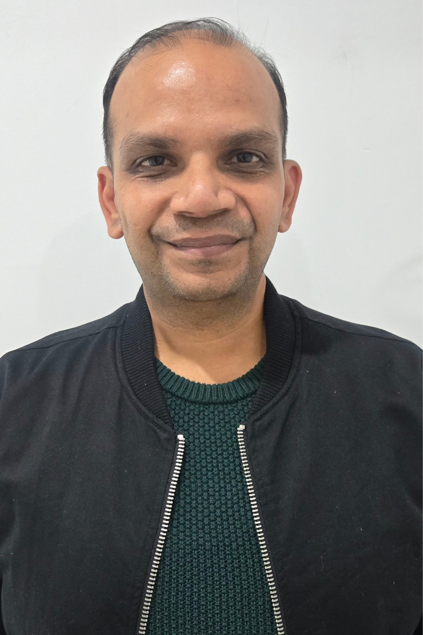 Portrait of Sunil Gupta, Attendance and Payroll Administrator